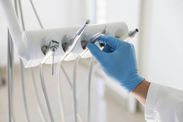 Professional Invisalign Clear Aligners technician working in Vergennes, VT